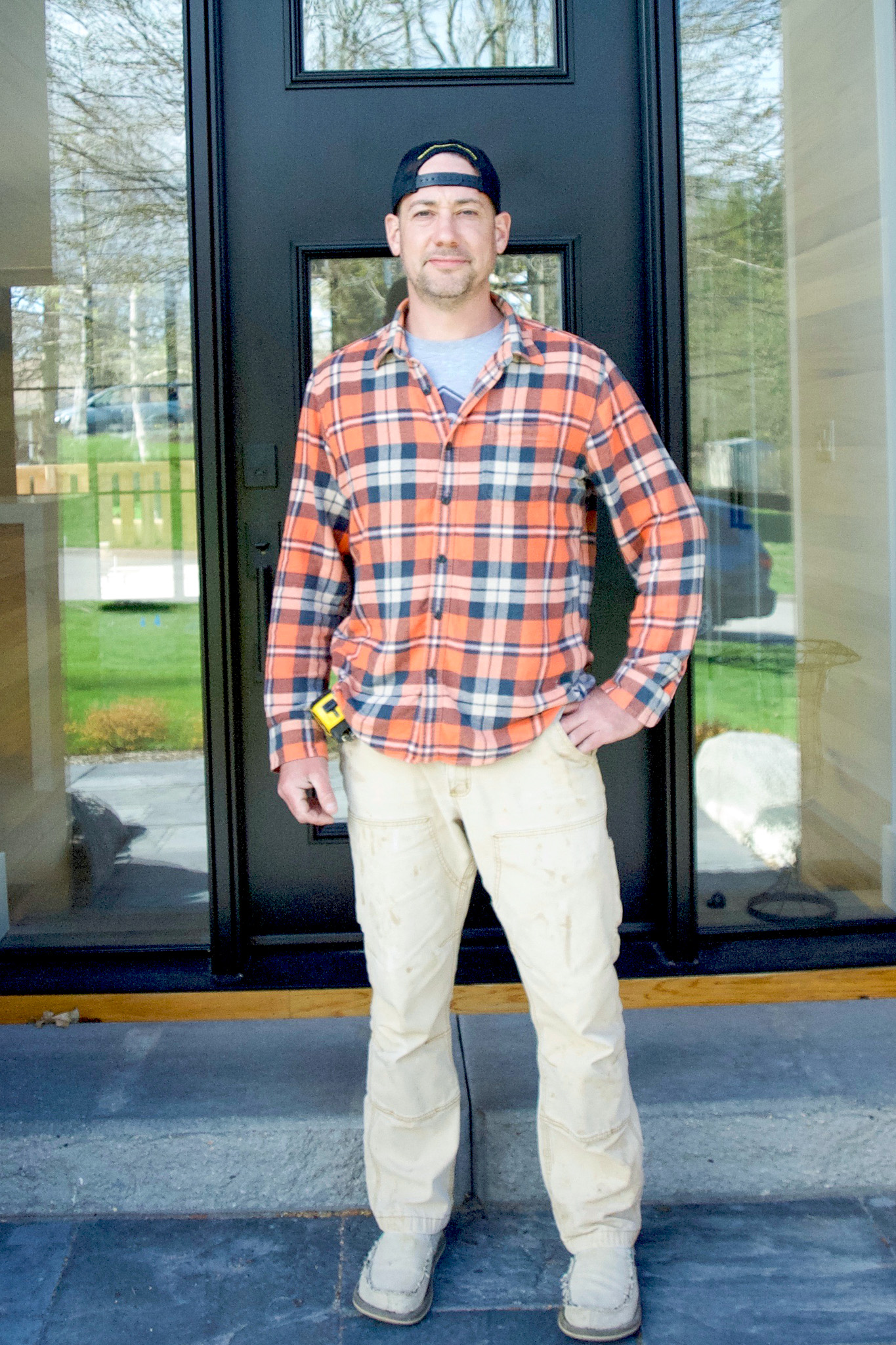 BCON Construction company's owner in front of a custom house